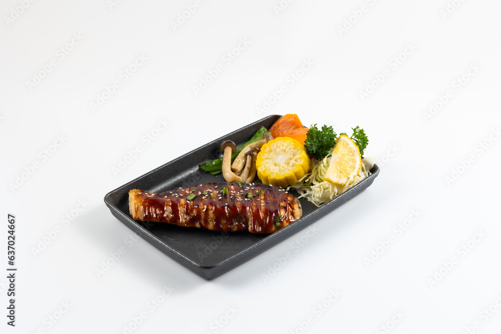 Grilled juicy pork steaks in hot pan. Top view, flat lay. Isolate on white background. Japanese food on restaurant table Grilled juicy pork steaks in hot pan. Top view, flat lay. Isolate on white background. Japanese food on restaurant table