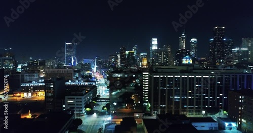 Wallpaper Mural Aerial Slow Motion Shot Of Illuminated Skyscrapers In City At Night, Drone Flying Over Cityscape - Los Angeles, California Torontodigital.ca