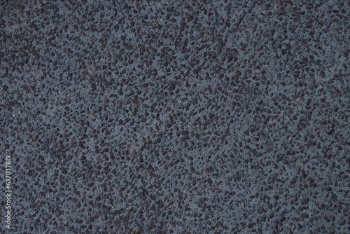 Topv view background texture of concrete pavement with small stones in it