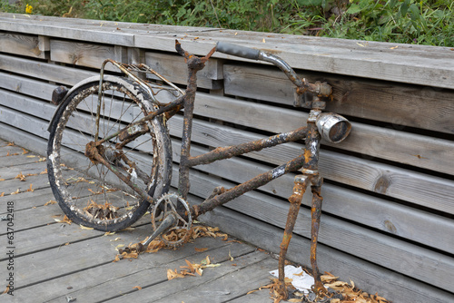 Rusty bicycle lifted from bottom of canal