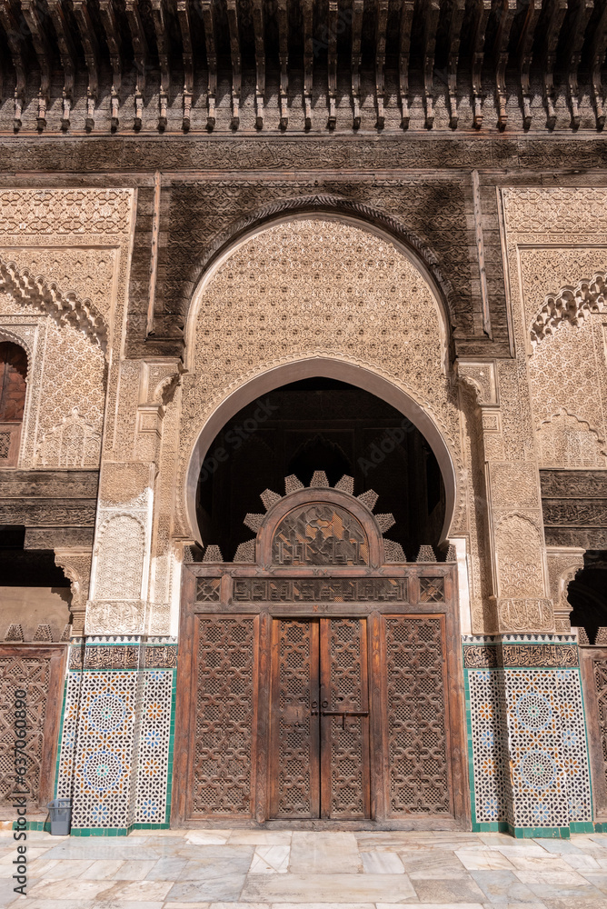 Φωτογραφία Traditional oriental facade at the courtyard of madrasa Bou Inaniya in the medin