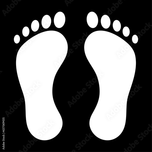 Foot print white silhouettes on black background