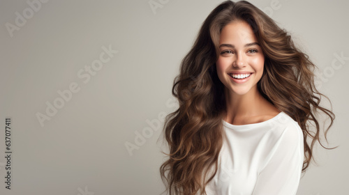 Woman with Broad Smile, White Sweater, and Long Hair 