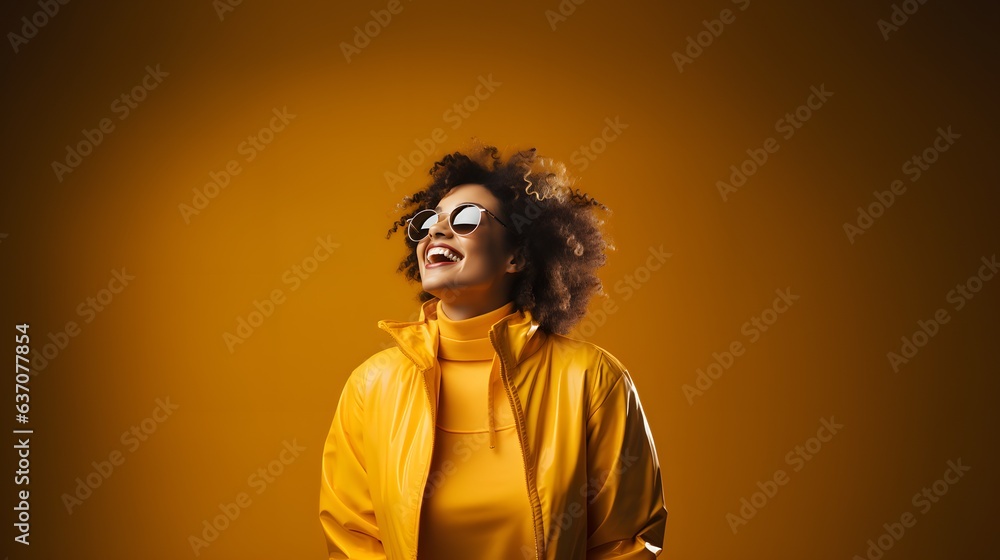 Yellow Elegance: Black Woman in Vibrant Attire Poses with Delight