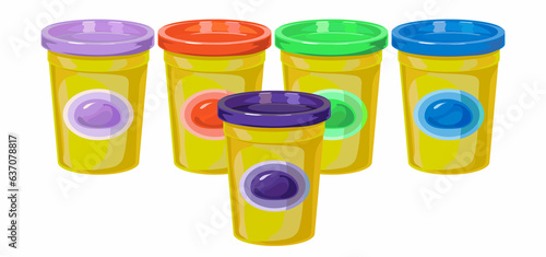 Yellow boxes with plasticine, plastic cup with lid, many colors, stand in a row. 