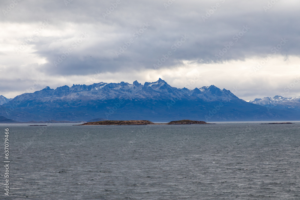 Blue Tinged Andes Mountains on Beagle Channel, Tierra del Fuego, Argentina on a Cloudy Day
