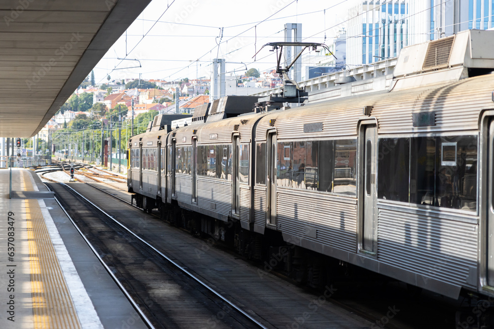 Fototapeta premium An old commuter train stands at an external station