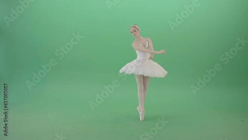 Prima ballerina ballet girl elegant dancing and spinning on green screen 4K Video Footage photo