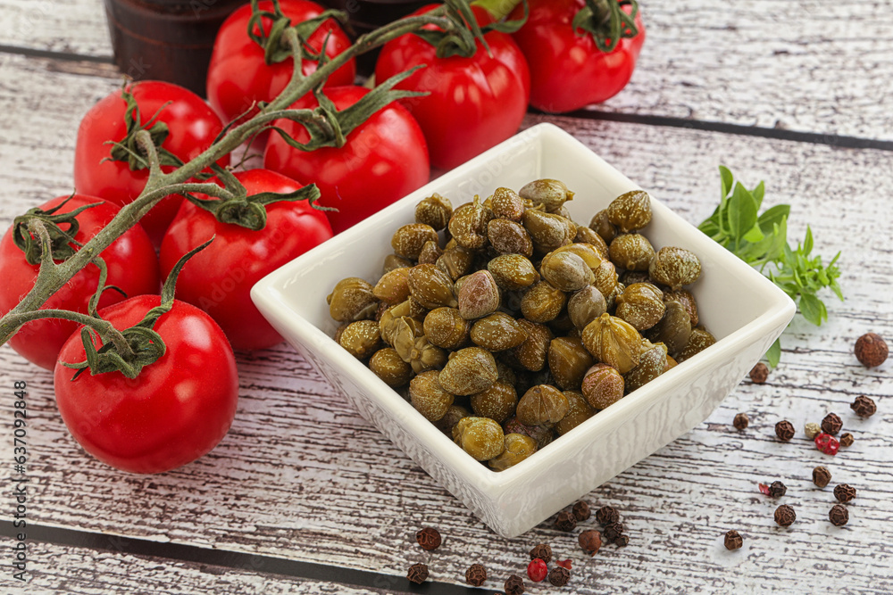 Marinated green capers in the bowl Marinated green capers in the bowl