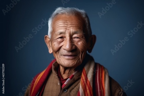 Medium shot portrait of an 100-year-old elderly Indian man in a minimalist background © Eber Braun