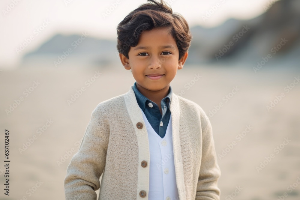 Lifestyle portrait of an Indian child male in a beach Lifestyle portrait of an Indian child male in a beach