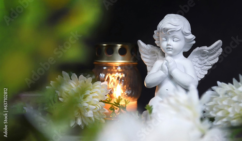 Condolence card with funeral candle, angel and flower