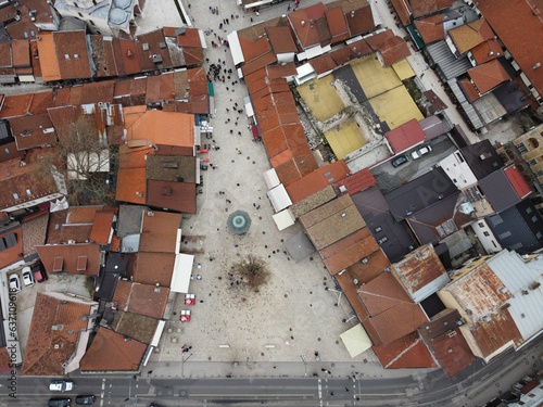 Aerial view of the bustling city of Sarajevo featuring the Begova Mosque in the center of the frame photo