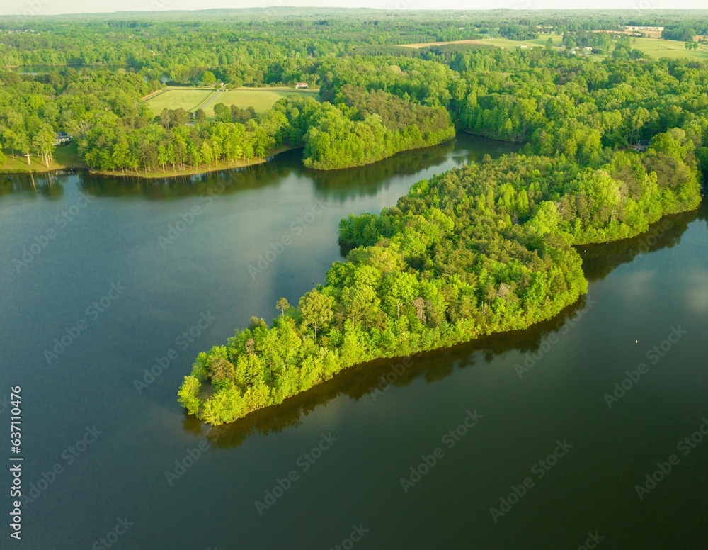 Aerial view of Lake Mackintosh surrounded by lush greenery. Burlington, North Carolina.