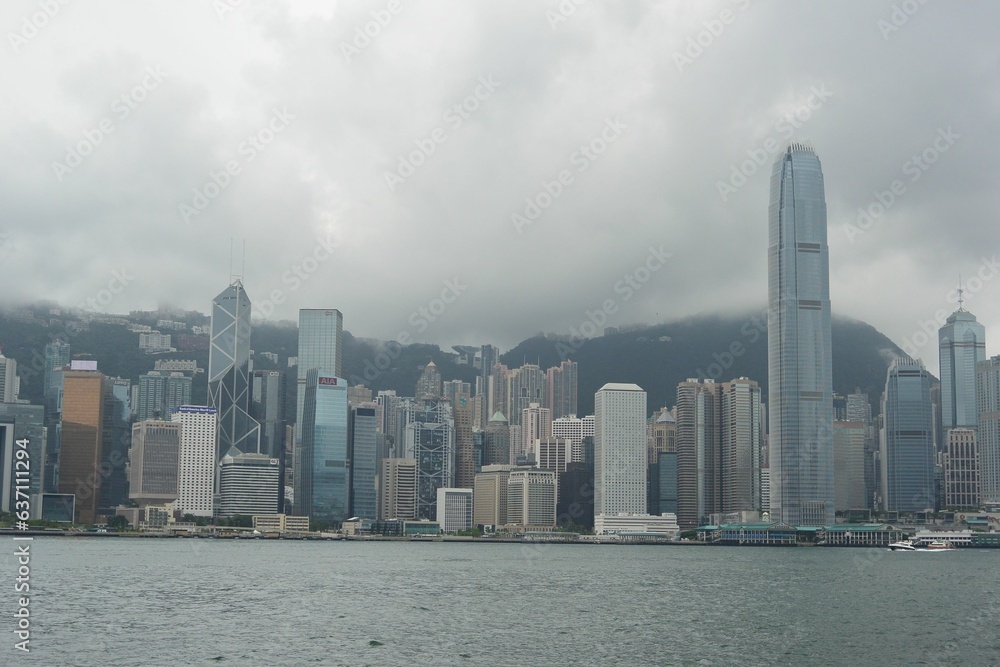 Naklejka premium Beautiful shot of the cityscape of Hong Kong on a foggy day