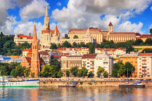 City summer landscape - view of the Buda Castle, palace complex on Castle Hill with Matthias Church over the Danube river in Budapest, Hungary