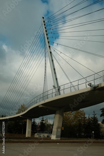 Fototapeta Naklejka Na Ścianę i Meble -  Low angle of the Chords Bridge, the Bridge of Strings in Jerusalem against the cloudy blue sky