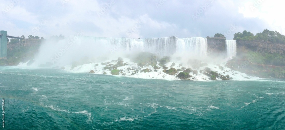 Spectacular view of picturesque Niagara Falls cascading down the side of a mountain in the USA Spectacular view of picturesque Niagara Falls cascading down the side of a mountain in the USA