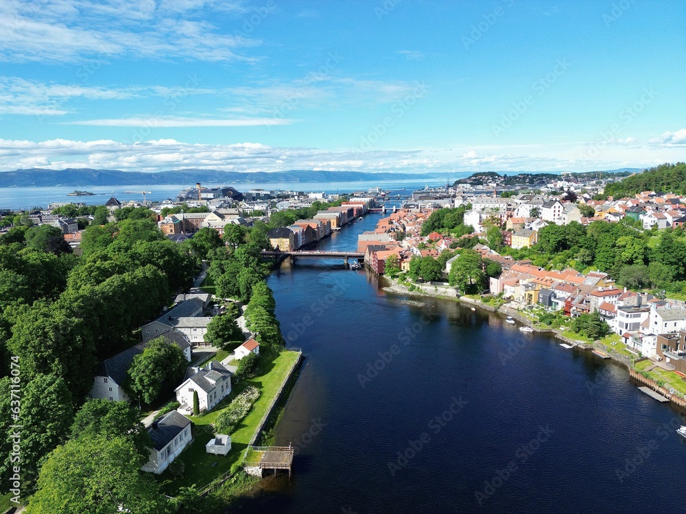 Drone view of Trondheim surrounded by greenery in Norway