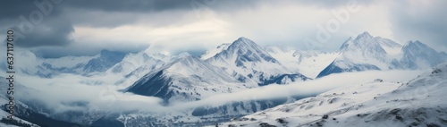 a range of snowy peaks with clouds Generative AI © SKIMP Art