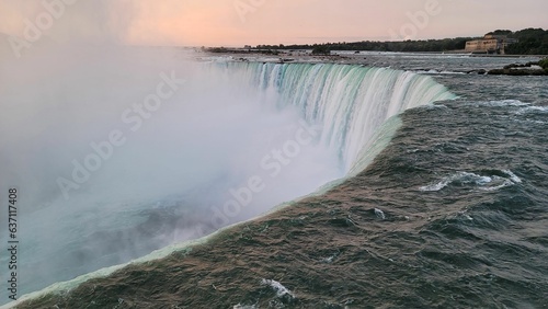 Scenic view of Niagara Falls in Canada at golden sunrise