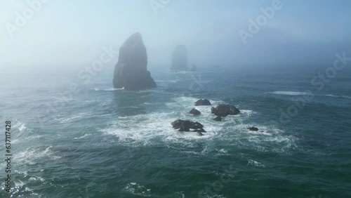 Beautiful view of massive rock formations in the middle of the sea on Canon Beach