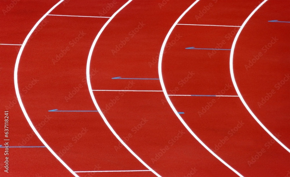 Running tracks on a sport stadium, red tartan with white lanes