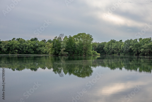 Landscape with pond in the sunshine