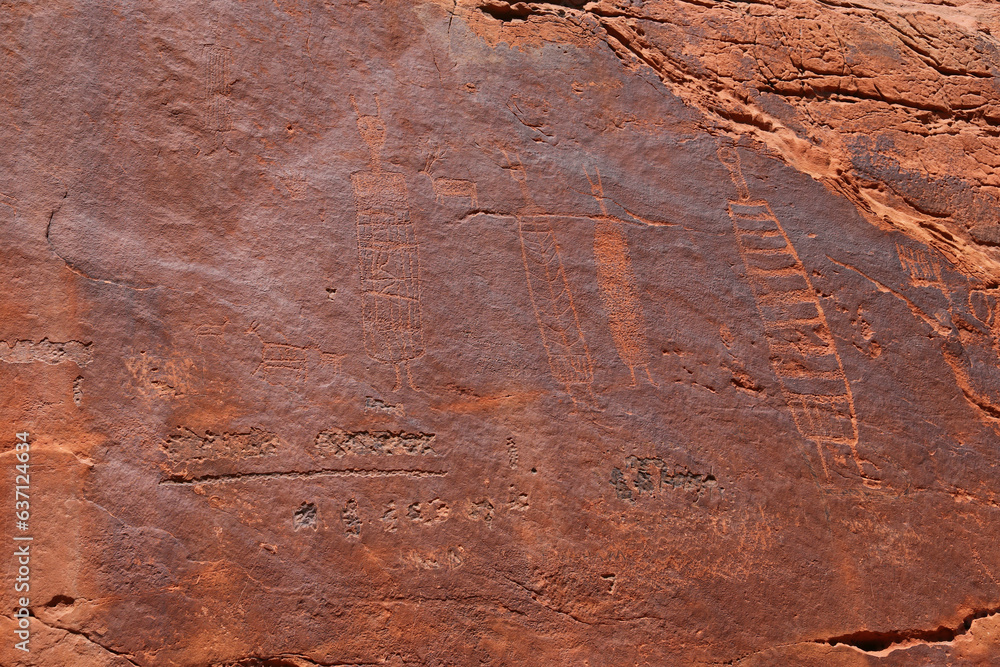Fototapeta premium Petroglyphs on the canyon walls located just south of the Glen Canyon dam in Arizona.
