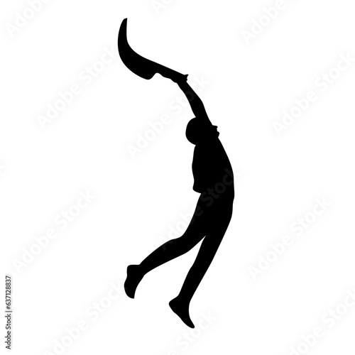 Silhouette of a person playing jai alai photo