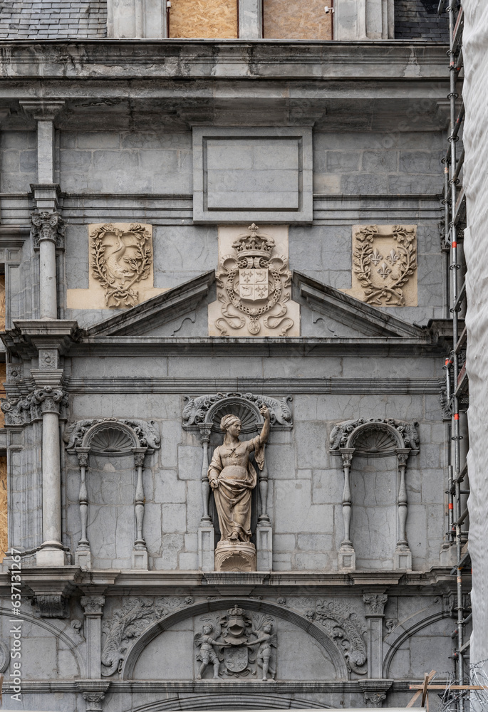 Façade of the 16th-century Palace of Justice (courthouse) with statues and basrelief, place Saint-André, Grenoble, France