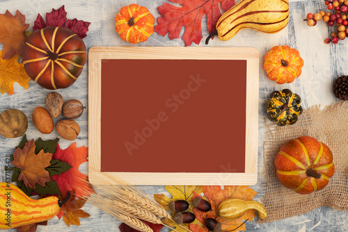 thanksgiving composition with letter board Happy Thanksgiving. Autumn pumpkins  acorns  and leaves. Flat lay. view from top