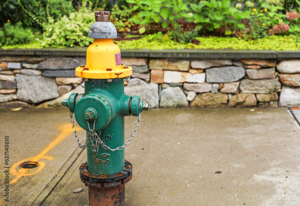 Fire hydrant stands ready, a beacon of safety and preparedness amidst cityscape's hustle, symbolizing protection Fire hydrant stands ready, a beacon of safety and preparedness amidst cityscape's hustle, symbolizing protection