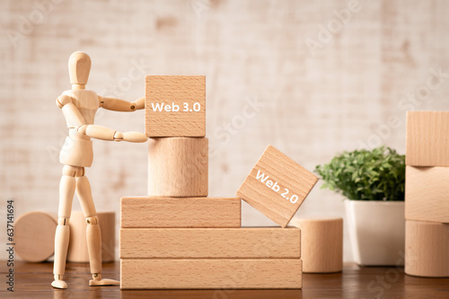 There is wood cube with the word Web3.0 or Web2.0. It is an abbreviation for Web3.0 or Web2.0 as eye-catching image. photo