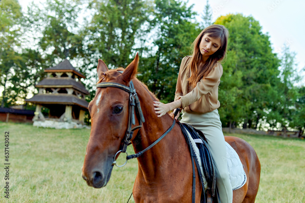 Canter on horseback. The allure of a young woman  gently stroking a horse.Engage in horse therapy, nature weekends, and stress relief through animal connection. Horse riding lesson experience gift