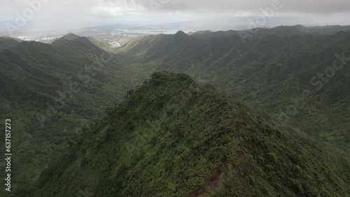 Hikers descend steep ridge trail toward Moanalua Valley, Honolulu photo