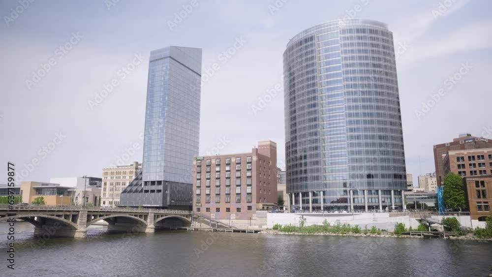 Large high rise buildings on the river front in downtown Grand Rapids, Michigan. Shot in 4k Large high rise buildings on the river front in downtown Grand Rapids, Michigan. Shot in 4k