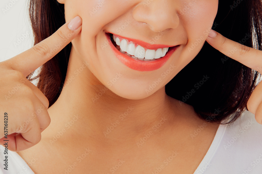 Obraz premium Asian woman with beautiful teeth : Closeup young woman's face with healthy teeth white clean beautiful smile : Happy woman taking care of her teeth perfectly : Oral care dentistry concept.