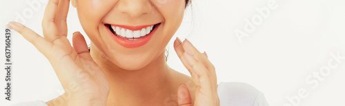 Asian woman with beautiful teeth : Closeup young woman's face with healthy teeth white clean beautiful smile : Happy woman taking care of her teeth perfectly : Oral care dentistry concept.