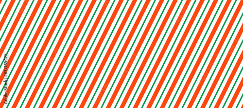 Candy cane seamless pattern. Red and green diagonal stripes background. Christmas repeating decoration texture. Winter holiday lines backdrop. Xmas peppermint package wrapping print. Vector wallpaper