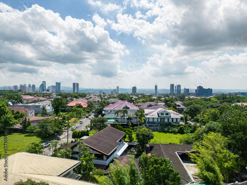 Manila, The Philippines –August 20, 2023. “A beautiful mid-morning cityscape panorama of Eastwood City as seen from Quezon City”.  photo