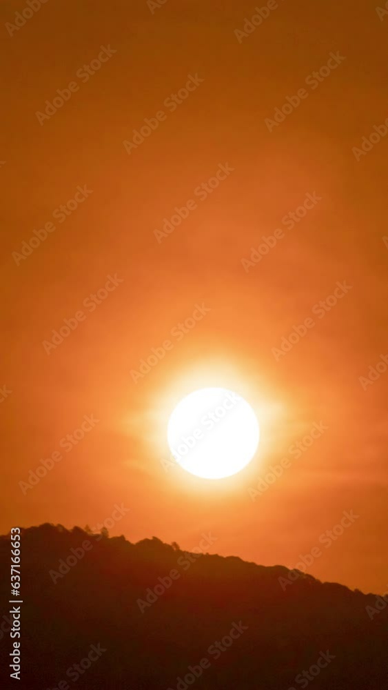 Timelapse of dramatic sunrise with orange sky in a sunny day. Timelapse of dramatic sunrise with orange sky in a sunny day.