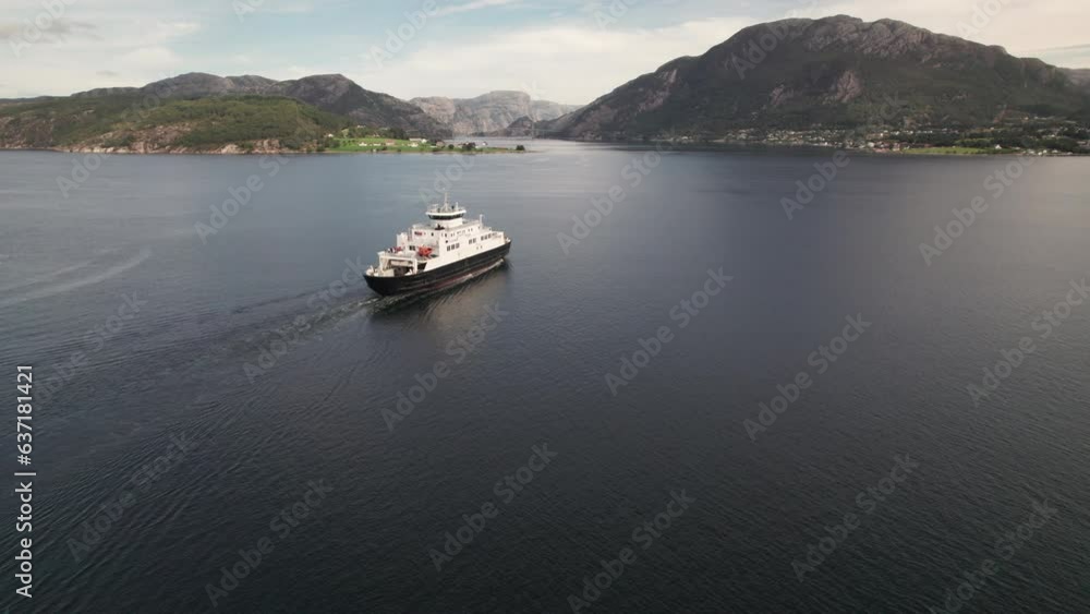 Impressive Rotating Drone Shot of a Car Ferry Crossing a Beautiful Fjord in Norway, Lauvvika-Oanes, Near Stavanger, Summer Sunny Day Impressive Rotating Drone Shot of a Car Ferry Crossing a Beautiful Fjord in Norway, Lauvvika-Oanes, Near Stavanger, Summer Sunny Day