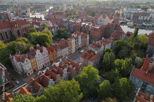 Beautiful panoramic architecture of old town in Gdansk, Poland at sunrise. Aerial view drone pov. Landscape cityscape City from Above. Small vintage historical buildings Europe Tourist Attractions