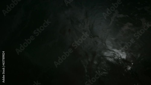 4K motion scene of water surface on dark background with electric light