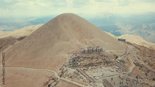 Ancient statues found on Mount Nemrut in Turkey. Aerial view of the 2150 meter high Mount Nemrut in the Southeastern Anatolia region of Turkey. photo