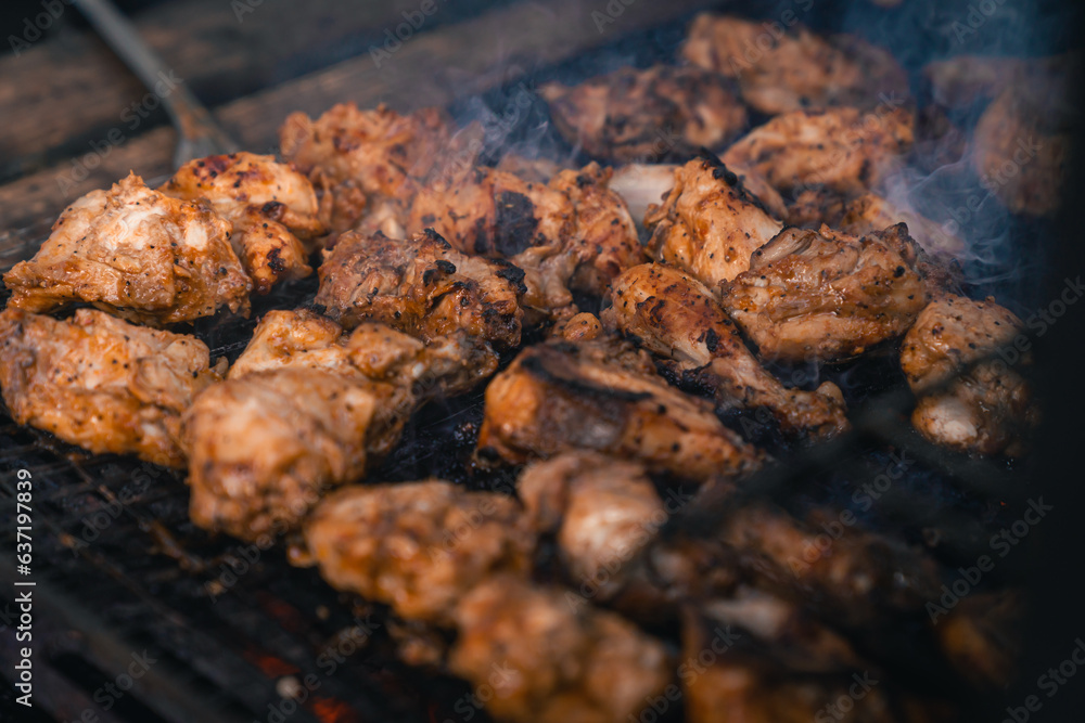 flavorful grilling close-up of chicken on charcoal bbq stove