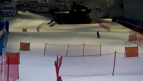 Young woman at the Attraction in the Mall of the Emirates 