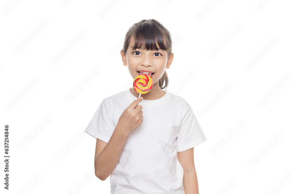 Young Asian girl holding lollipop candy isolated on white background with clipping path. Young Asian girl holding lollipop candy isolated on white background with clipping path.