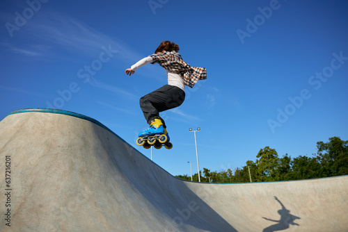 Teenager guy riding roller skates performing speed moving